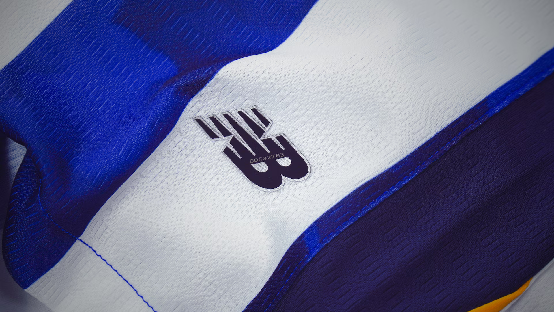 Official New Balance football shirts — shop home, away and third kits for top clubs and national teams at Footballshirts.com