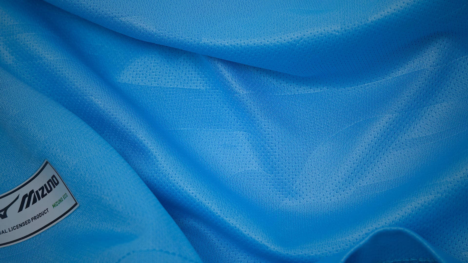 Official Mizuno football shirts — shop home, away and third kits for top clubs at Footballshirts.com